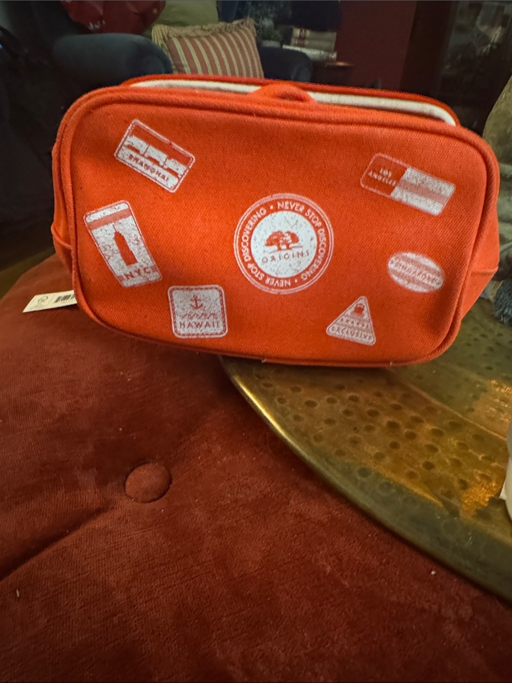Origins Orange Canvas Cosmetic Pouch with White Stamp Details